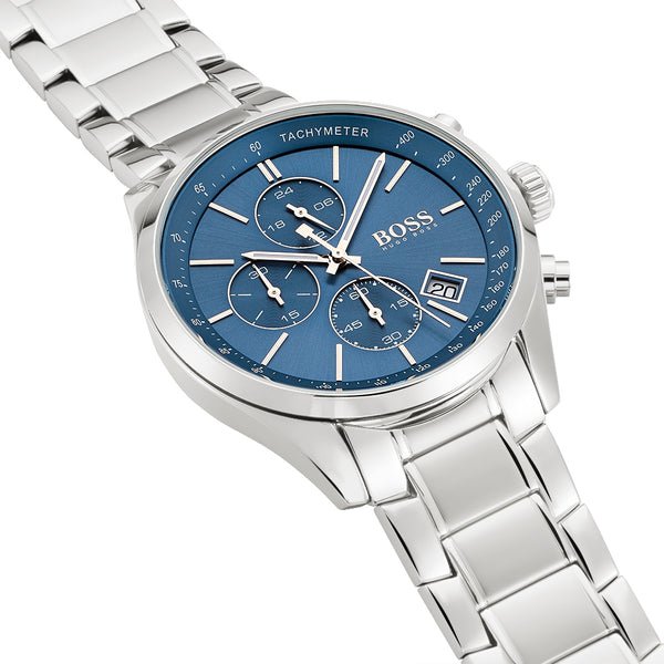 Hugo Boss chronograph watch worn on wrist showing blue dial with tachymeter and date window