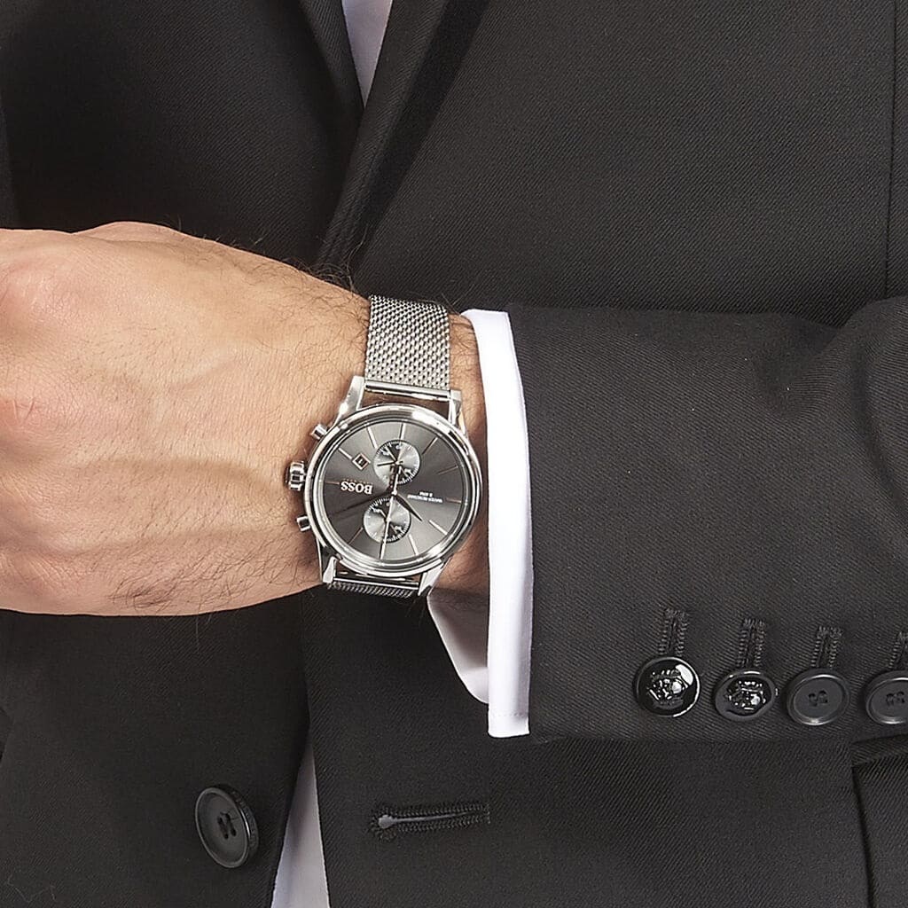 Hugo Boss Jet chronograph watch worn on wrist with silver mesh bracelet and grey dial visible