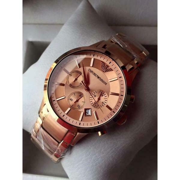 Rose gold chronograph watch worn on wrist showing full dial and bracelet