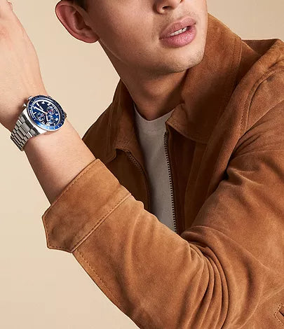 Fossil Sport Tourer Chronograph watch worn on wrist with blue dial visible