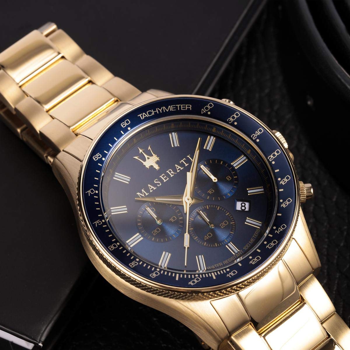 Detail view of Maserati Sfida blue dial with Roman numerals and chronograph subdials