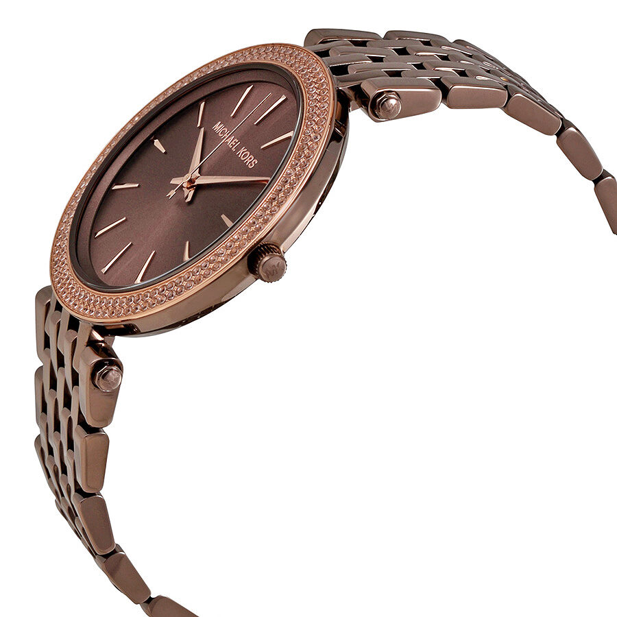 Side angle view of Michael Kors Darci watch showing sable dial and rose gold bezel detail