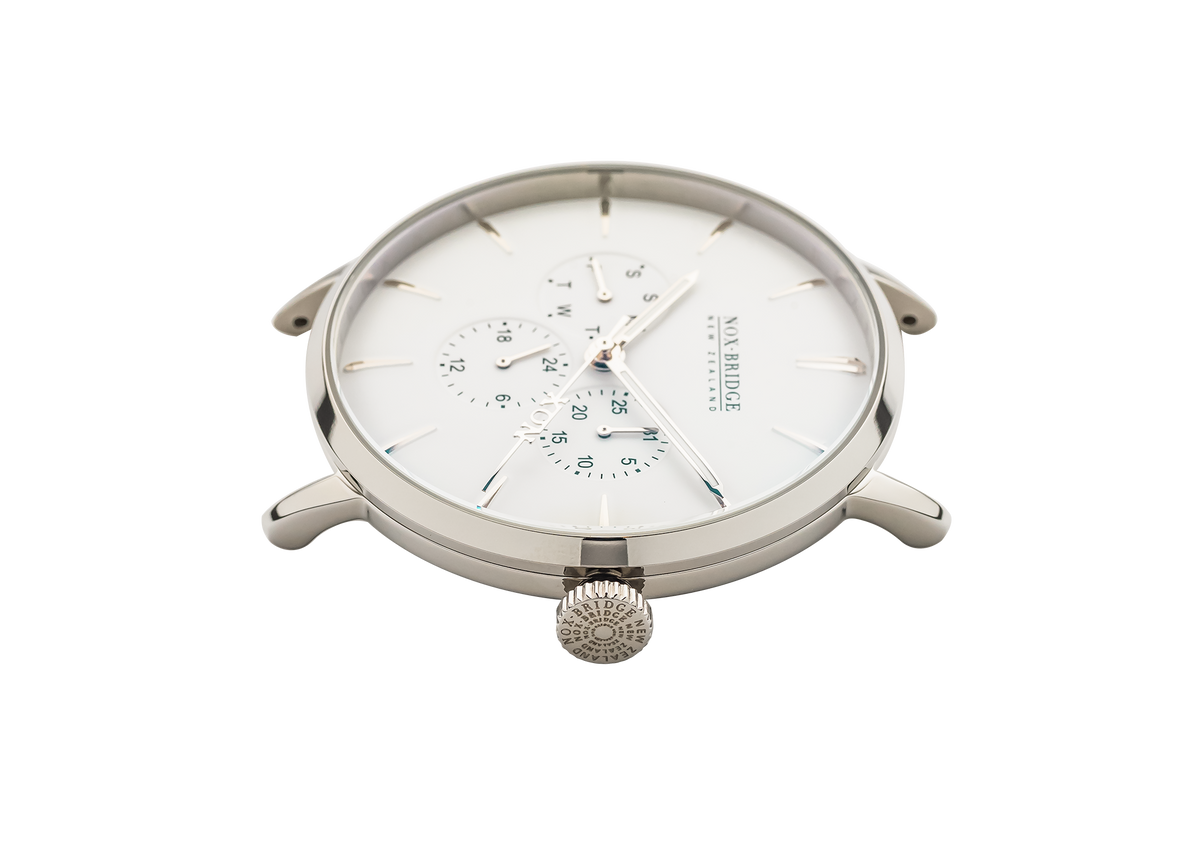 Angled view of Noxbridge Classic Capella silver watch with white dial and dual subdials