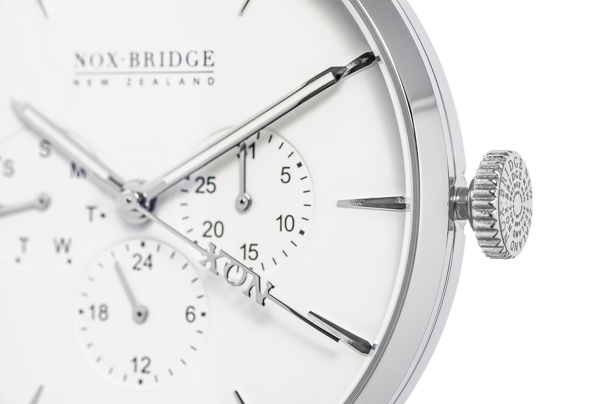 Close-up of Capella dial showing subdials, markers, and textured crown detail