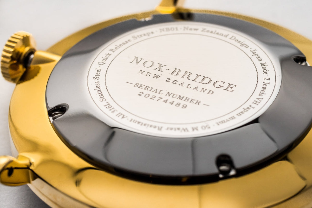 Noxbridge VG36 caseback with serial number and New Zealand branding